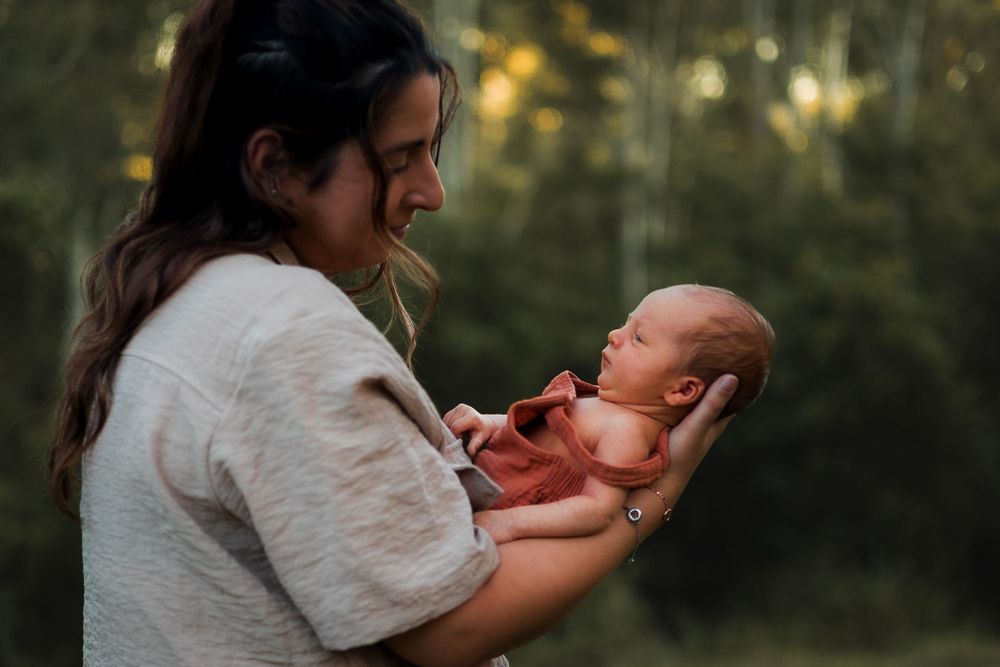 Candid newborn photography at Sunshine Coast, featuring delicate newborn features and heartfelt family moments