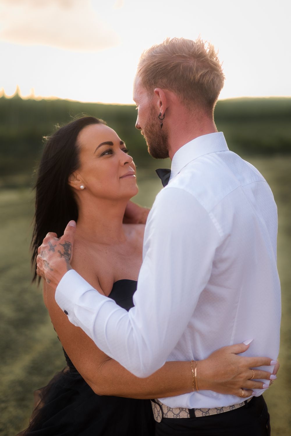Engagement photography session with couple who are staring into each others eyes in beerwah on the Sunshine Coast at sunset