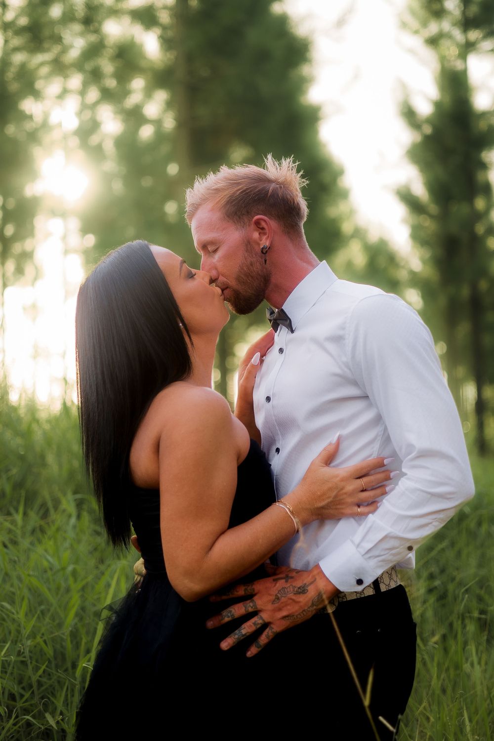 Engagement photography session with couple who are kissing in beerwah on the Sunshine Coast at sunset