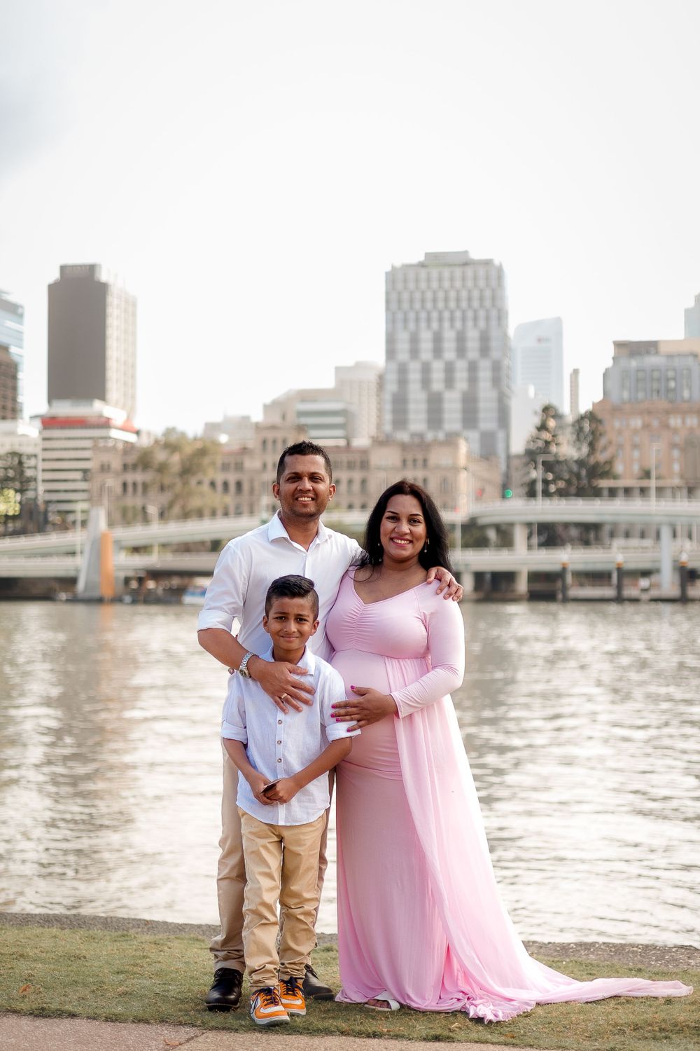 Maternity photoshoot at South Bank, Brisbane, capturing a family of 3 with love and anticipation for their growing family