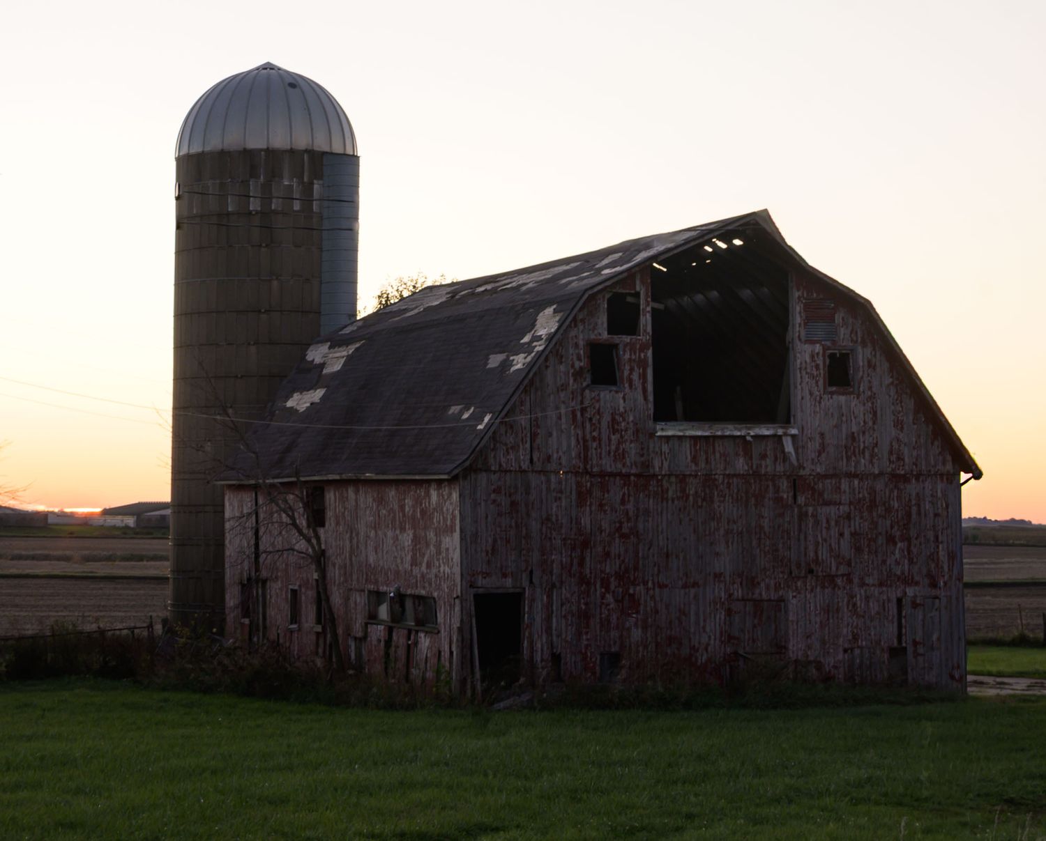 Iowa barn and silo at sunrise; near Fort Dodge Iowa