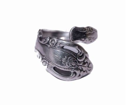 Ornate vintage silver spoon ring with intricate floral scroll design and adjustable wrap-around style.