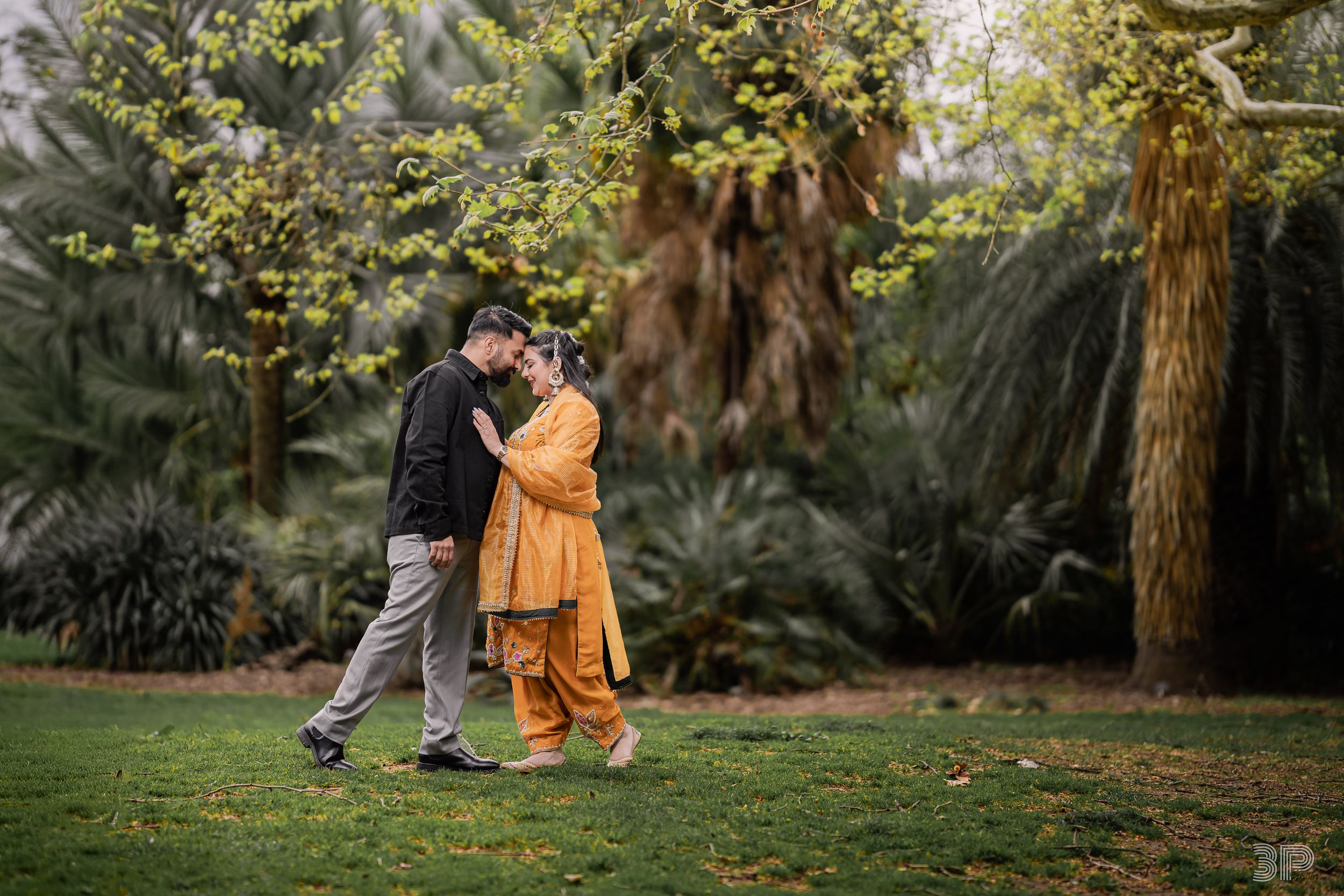 Couple celebrating their anniversary with a heartfelt outdoor photoshoot, radiating love and affection.
