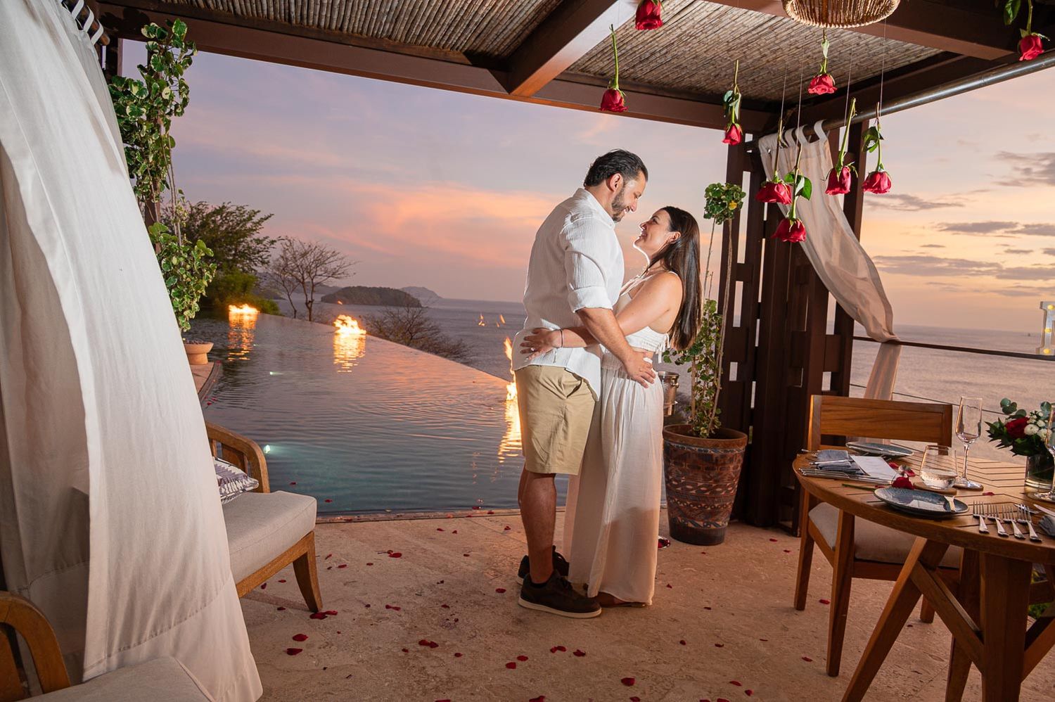 Elegant proposal setup with flowers and candles at Casa Chameleon Costa Rica