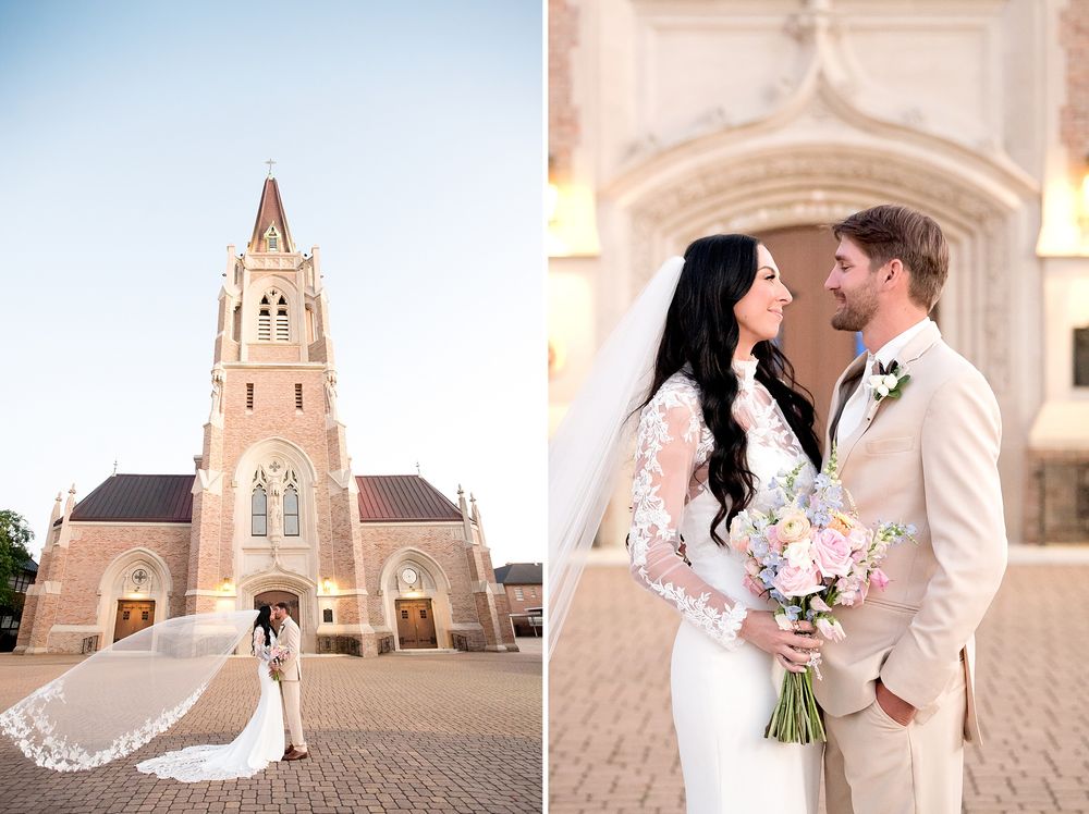 Bride and groom pose outside a historic brick church, her veil flowing, holding a pastel bouquet in elegant wedding attire.