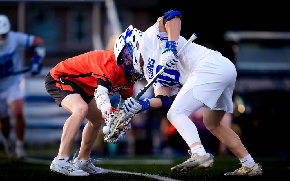 Lower Dauphin Falcons and Palmyra Cougars battle for a ground ball, PIAA Districts by Deanna Fox, SportsFox Photography based in Hershey PA