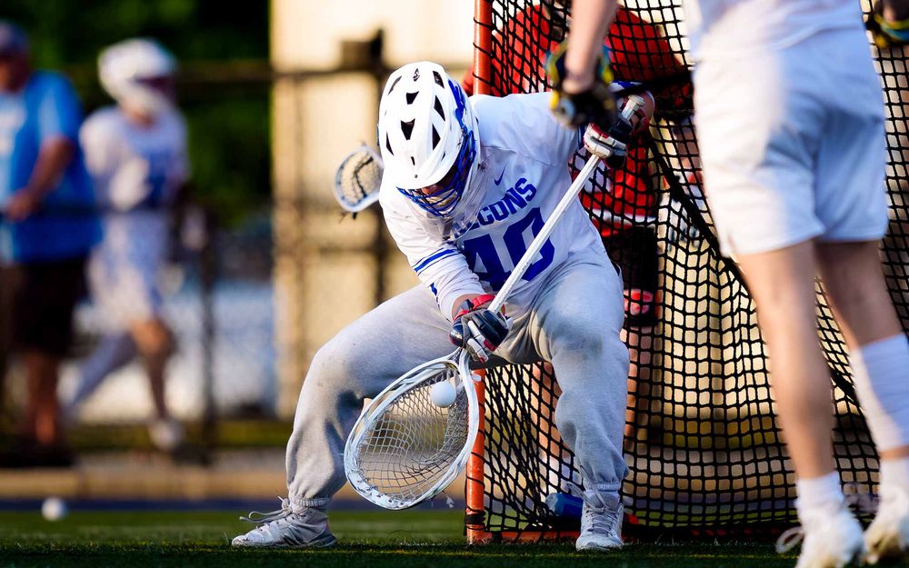 Lower Dauphin Falcons player at the crease vs. Palmyra Cougars, PIAA Districts by Deanna Fox, SportsFox Photography based in Hershey PA