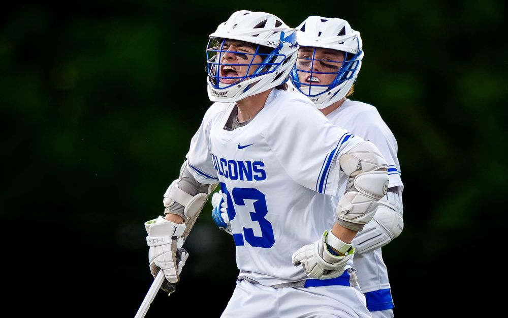 Lower Dauphin Falcons #23 and teammate on the sideline, PIAA Districts lacrosse by Deanna Fox, SportsFox Photography based in Hershey PA
