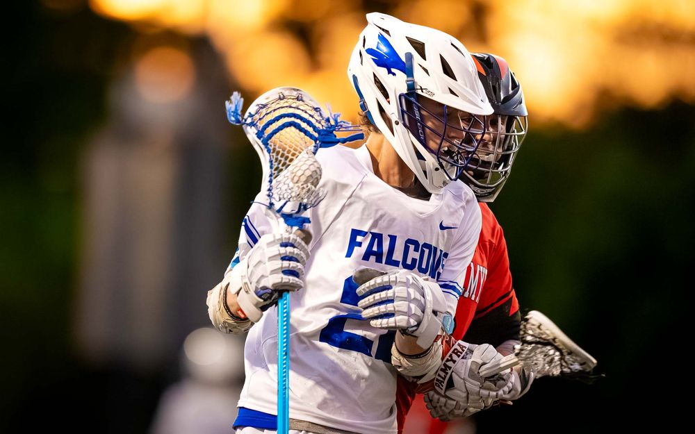 Lower Dauphin Falcons #2 fights through Palmyra defense at sunset, PIAA Districts by Deanna Fox, SportsFox Photography based in Hershey PA