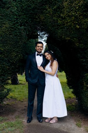 Couple photoshoot near Painswick Church in the Cotswolds countryside.
