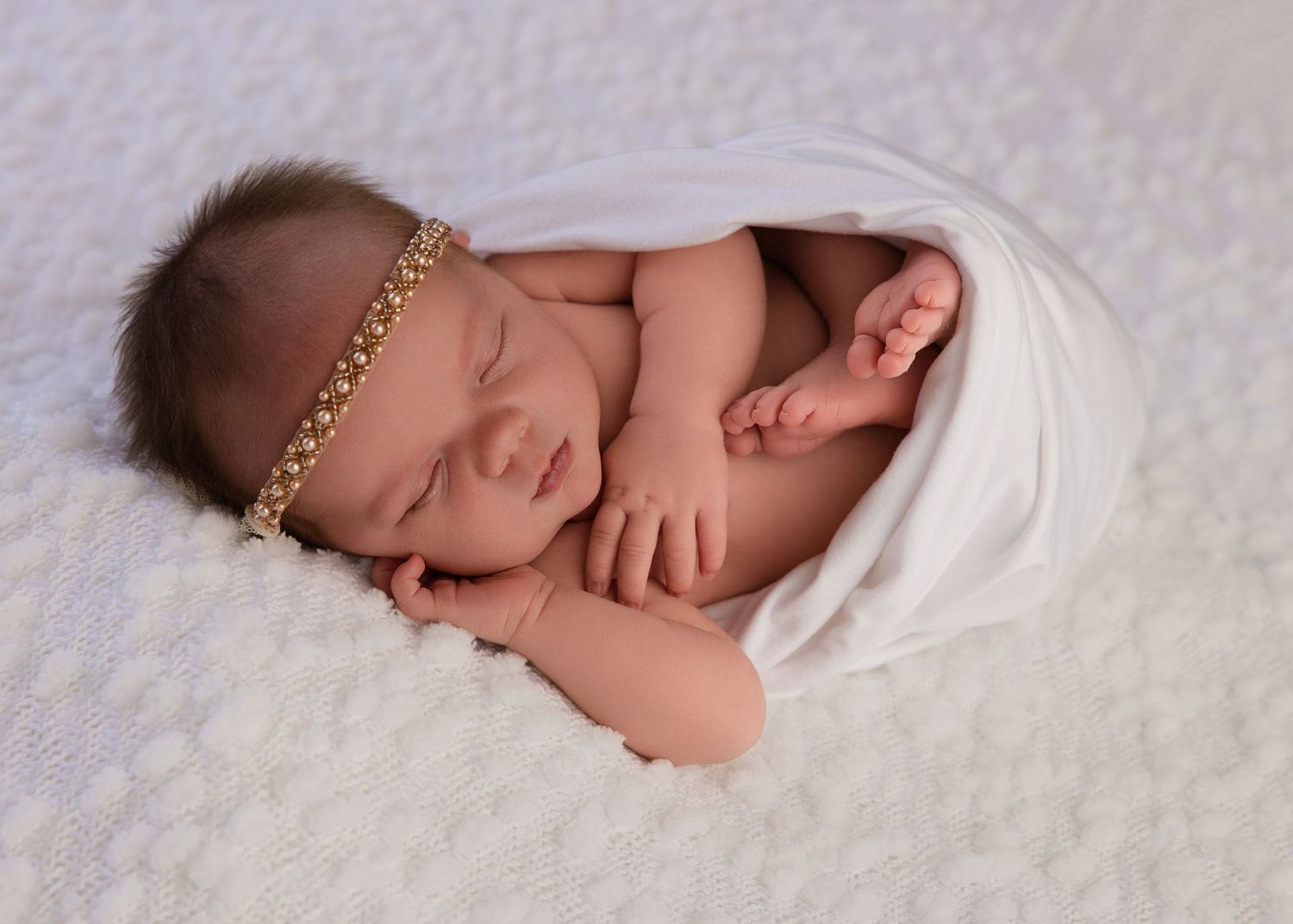 Studio newborn photography in Salt Lake City with clean, neutral setups