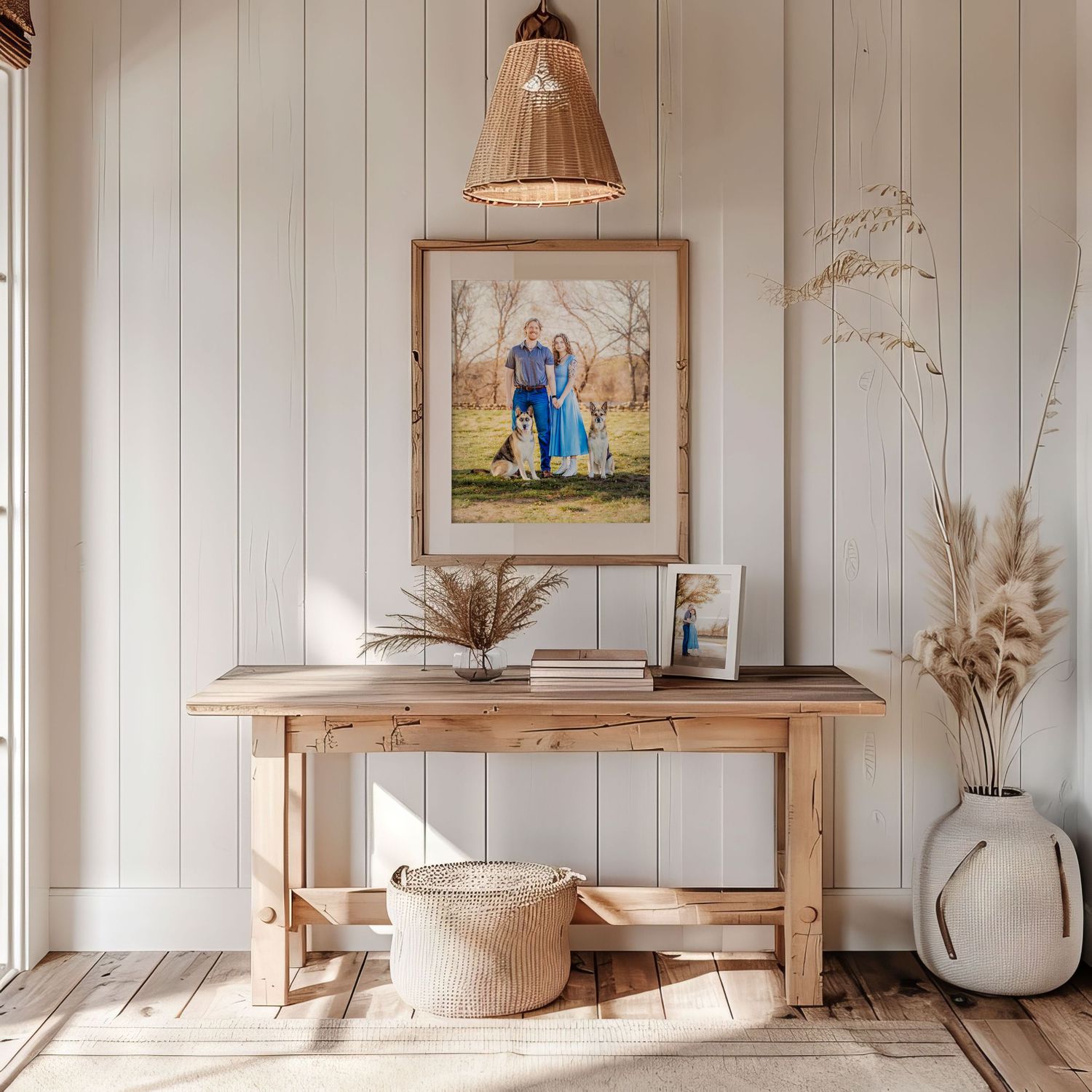 Modern minimalist interior with white paneled walls, wooden furniture, pendant lamps and natural light streaming through windows.