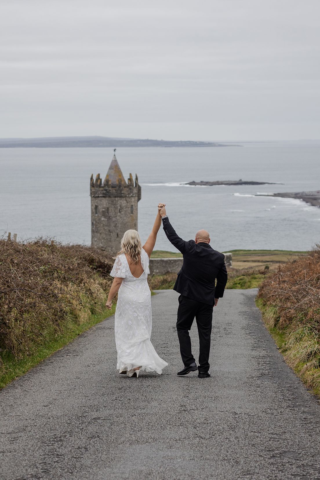 Elopement portraits at Doonagore Castle in County Clare, Ireland.