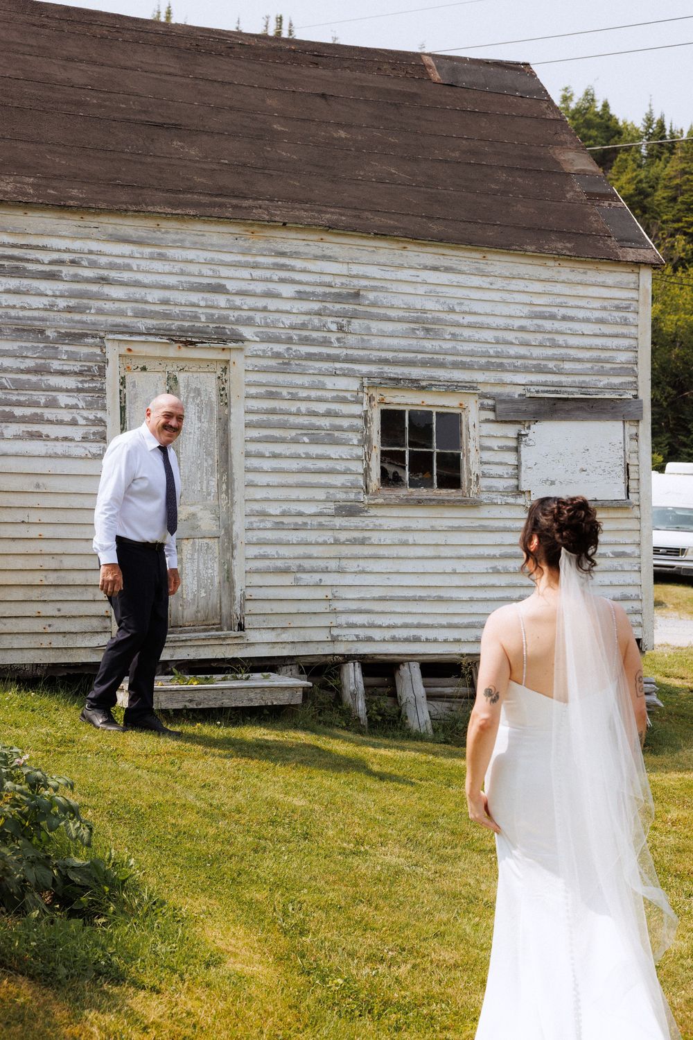 Bride and groom with family in Trinity captured by Newfoundland documentary style wedding photographer Kaitlyn Yvette