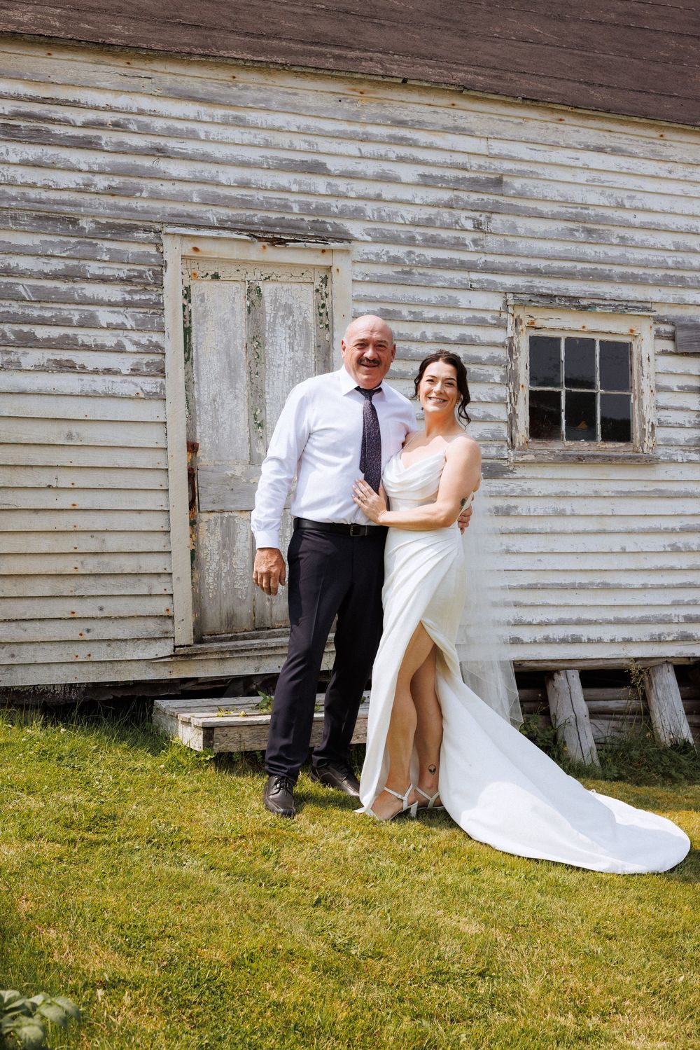 Bride and groom with family in Trinity captured by Newfoundland documentary style wedding photographer Kaitlyn Yvette