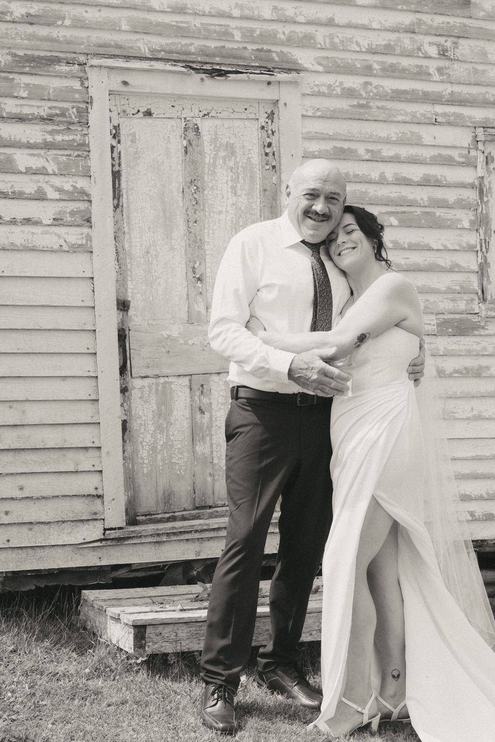 Bride and groom with family in Trinity captured by Newfoundland documentary style wedding photographer Kaitlyn Yvette