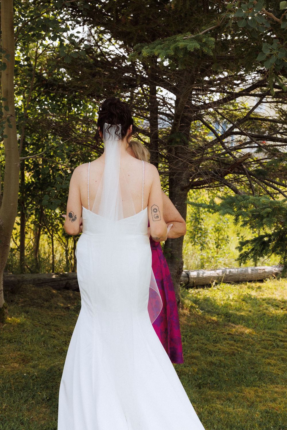Bride and groom with family in Trinity captured by Newfoundland documentary style wedding photographer Kaitlyn Yvette