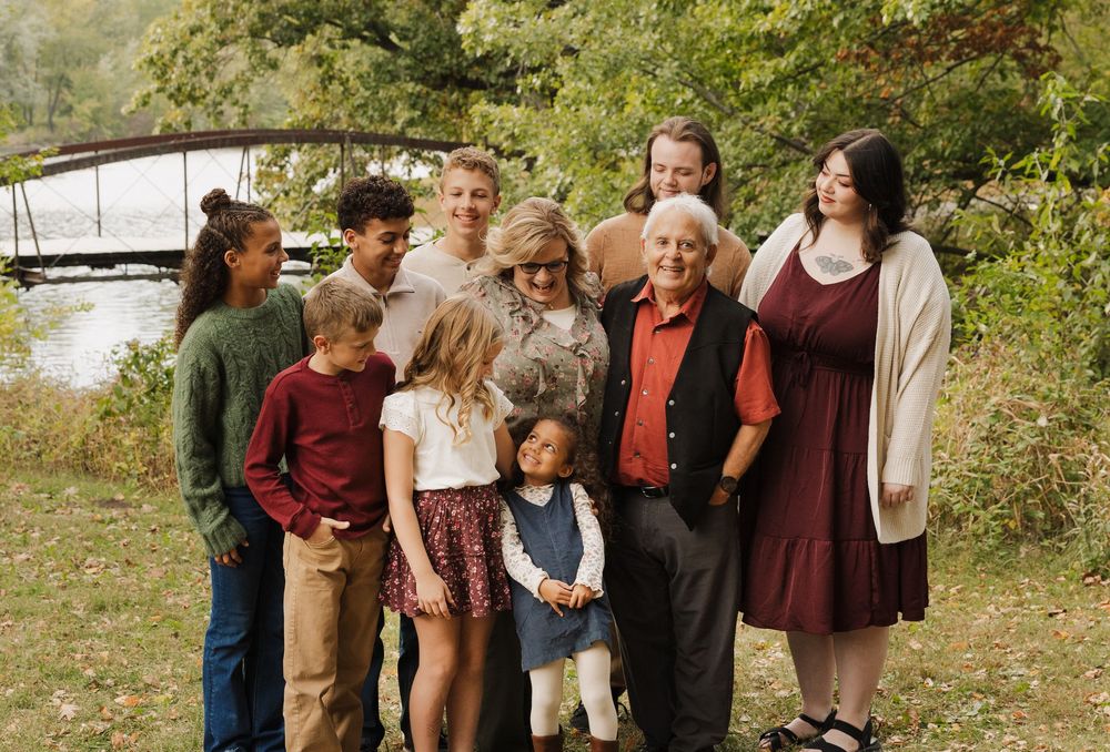 A series of vintage family photographs from the 1970s showing outdoor gatherings and group portraits.