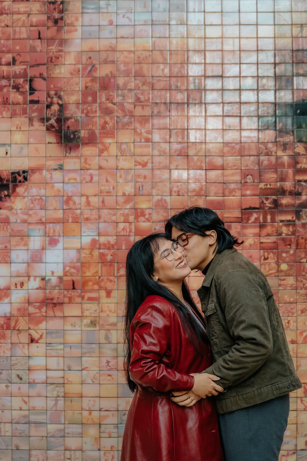 Joyful kiss in front of El Beso mural Gothic Quarter Honeymoon photoshoot Barcelona BarcelonaLoversPH