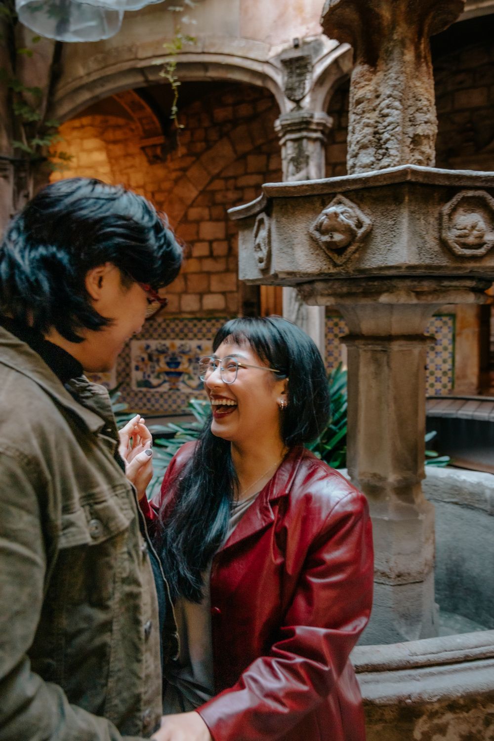 Tender hug under Neo Gothic bridge Barcelona Honeymoon photoshoot Barcelona BarcelonaLoversPH