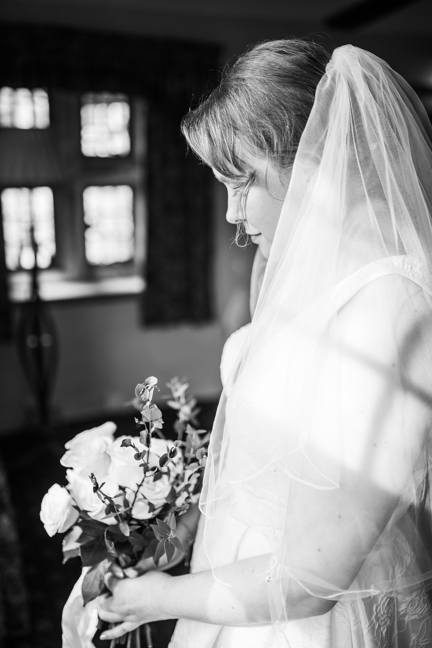 Bride moments before the ceremony at Holdsworth House Historic Wedding Venue