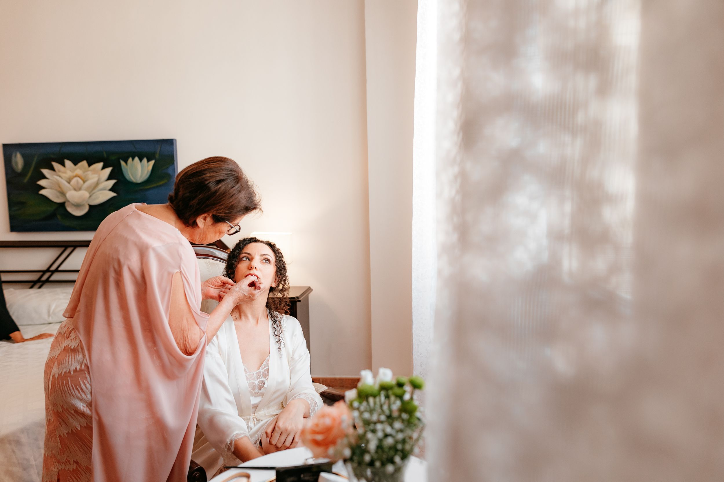 A series of soft, romantic photographs showing tender moments in a light-filled interior space.