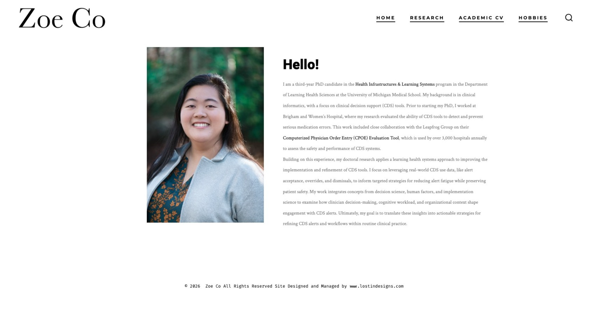 Minimalist portfolio website design with clean navigation menu and hello greeting section in white background.