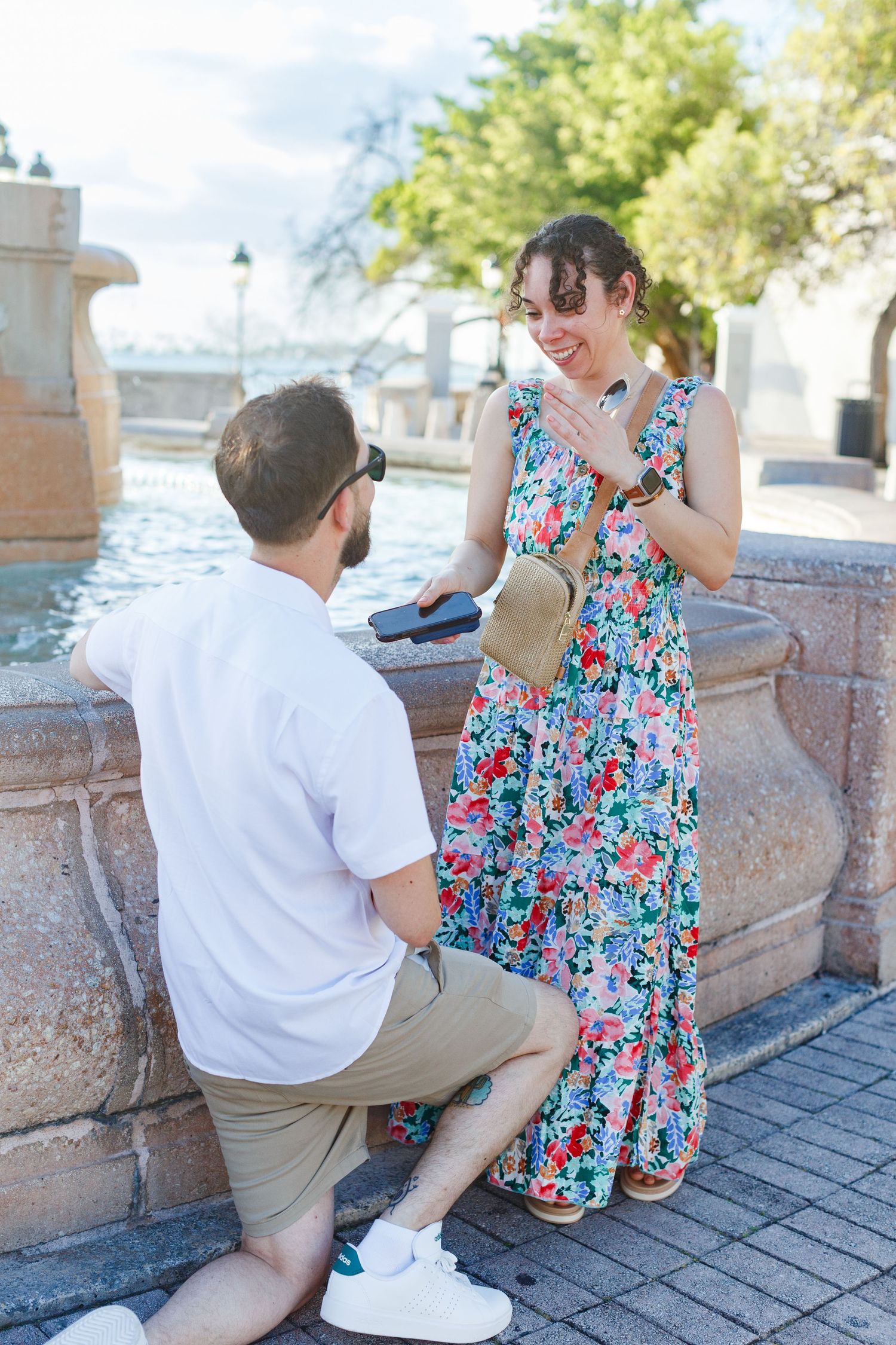 Couples portrait. Marriage proposal at Fuente Raíces in Old San Juan, Puerto Rico.