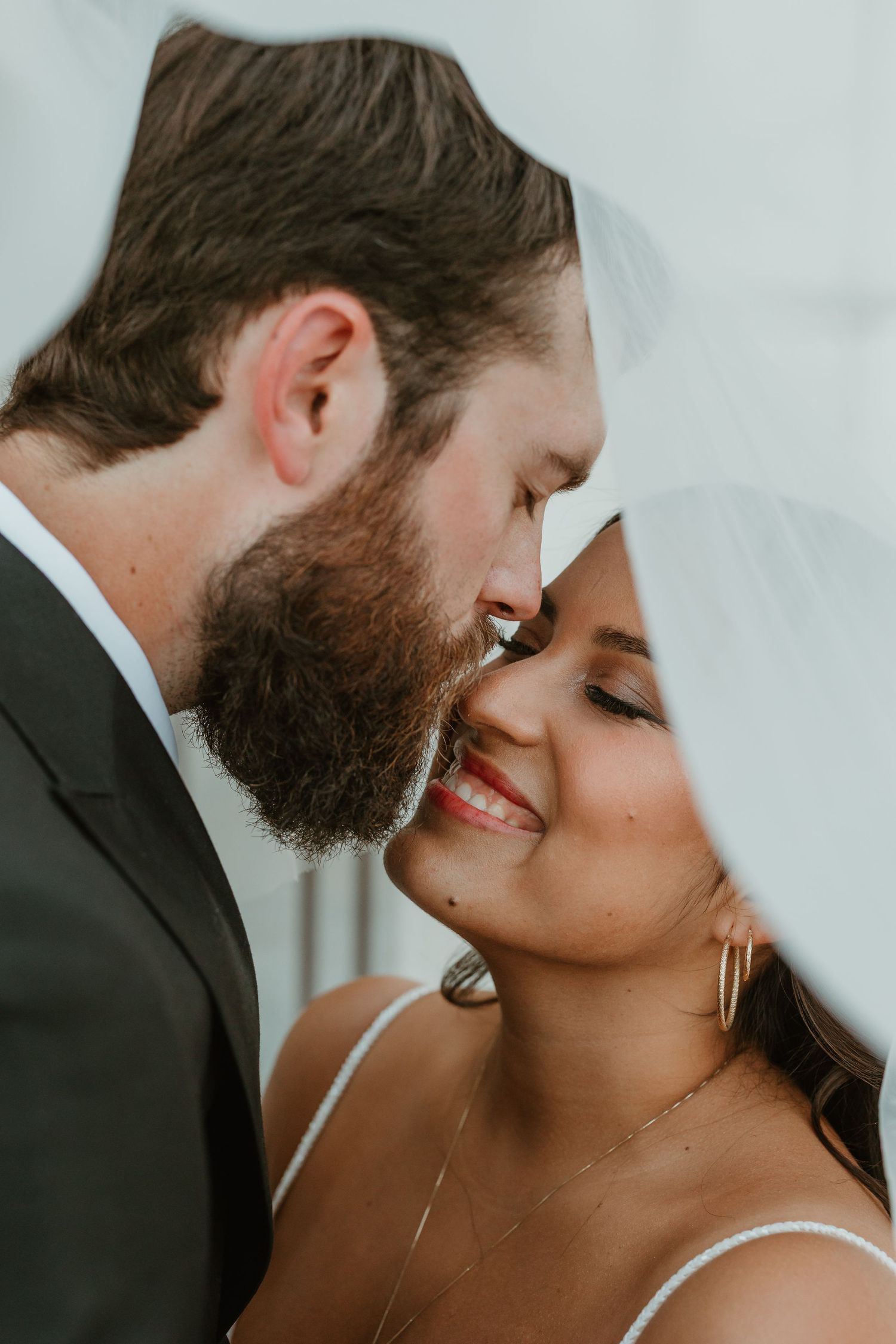 Intimate couple portrait photographed with a calm, editorial style during a Michigan wedding celebration at the Detroit Institute of Arts.