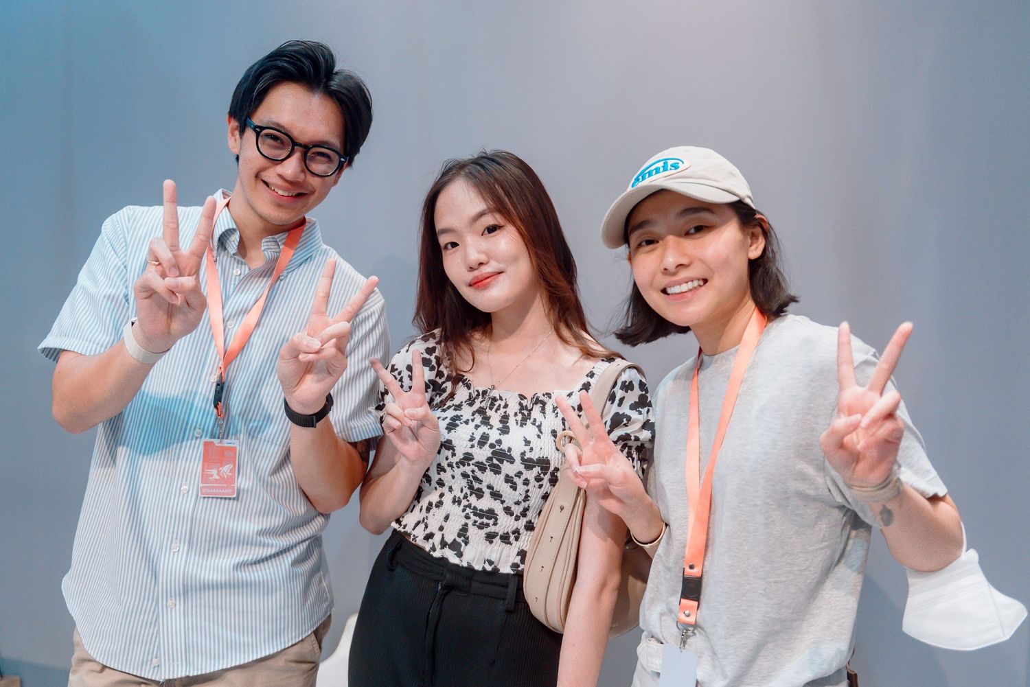 A group of people posing together at what appears to be a professional event or conference.