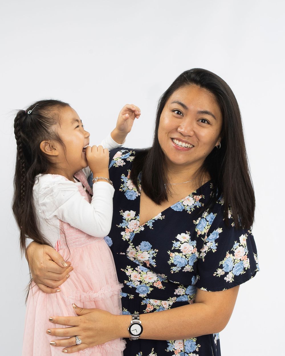 Mother and daughter have a laugh during family photography session with Souther California Photographer.