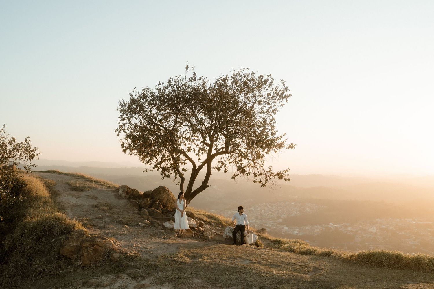 Classic white wedding venue with grand stone staircase and ornate architectural details.