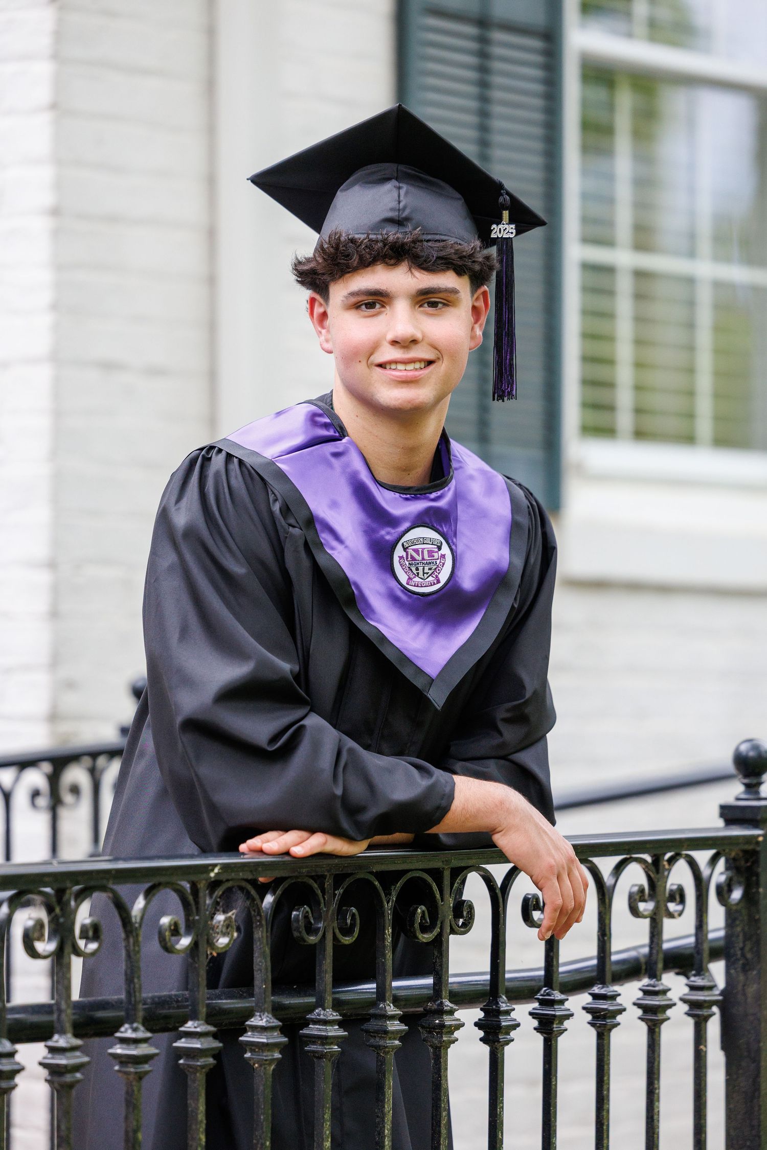 boy strumming a guitar. image of a guitar for senior pictures