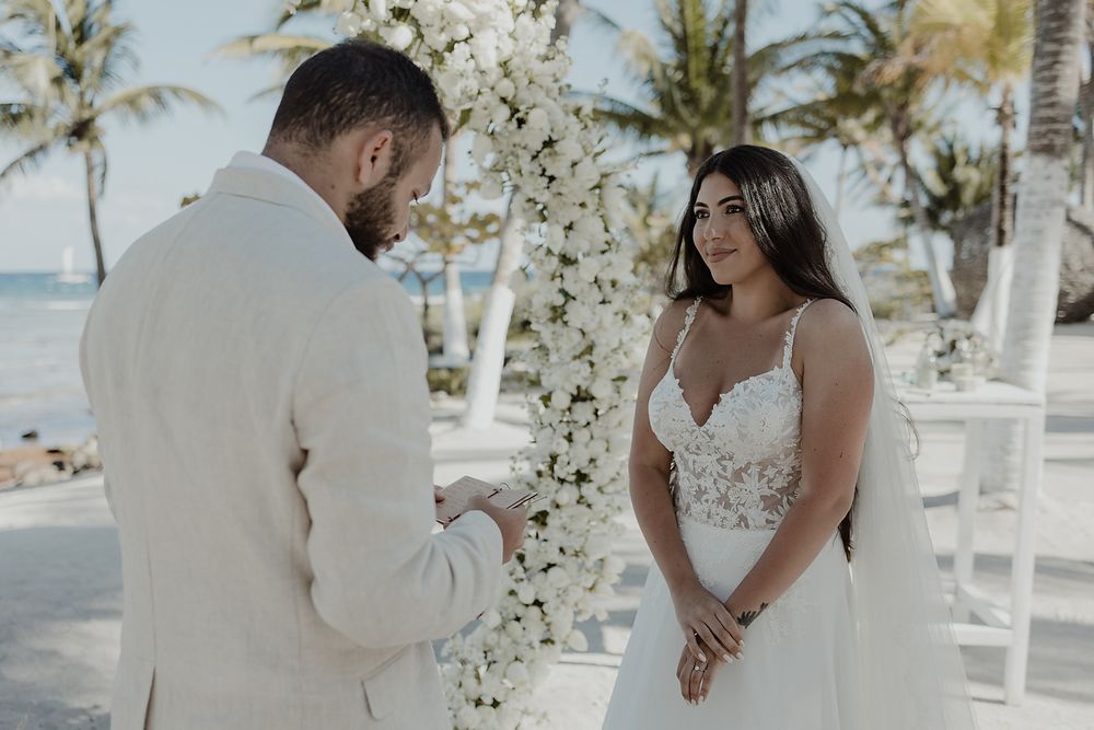 Couple looking at each other during vows Blue Venado Riviera Maya elopement photography.