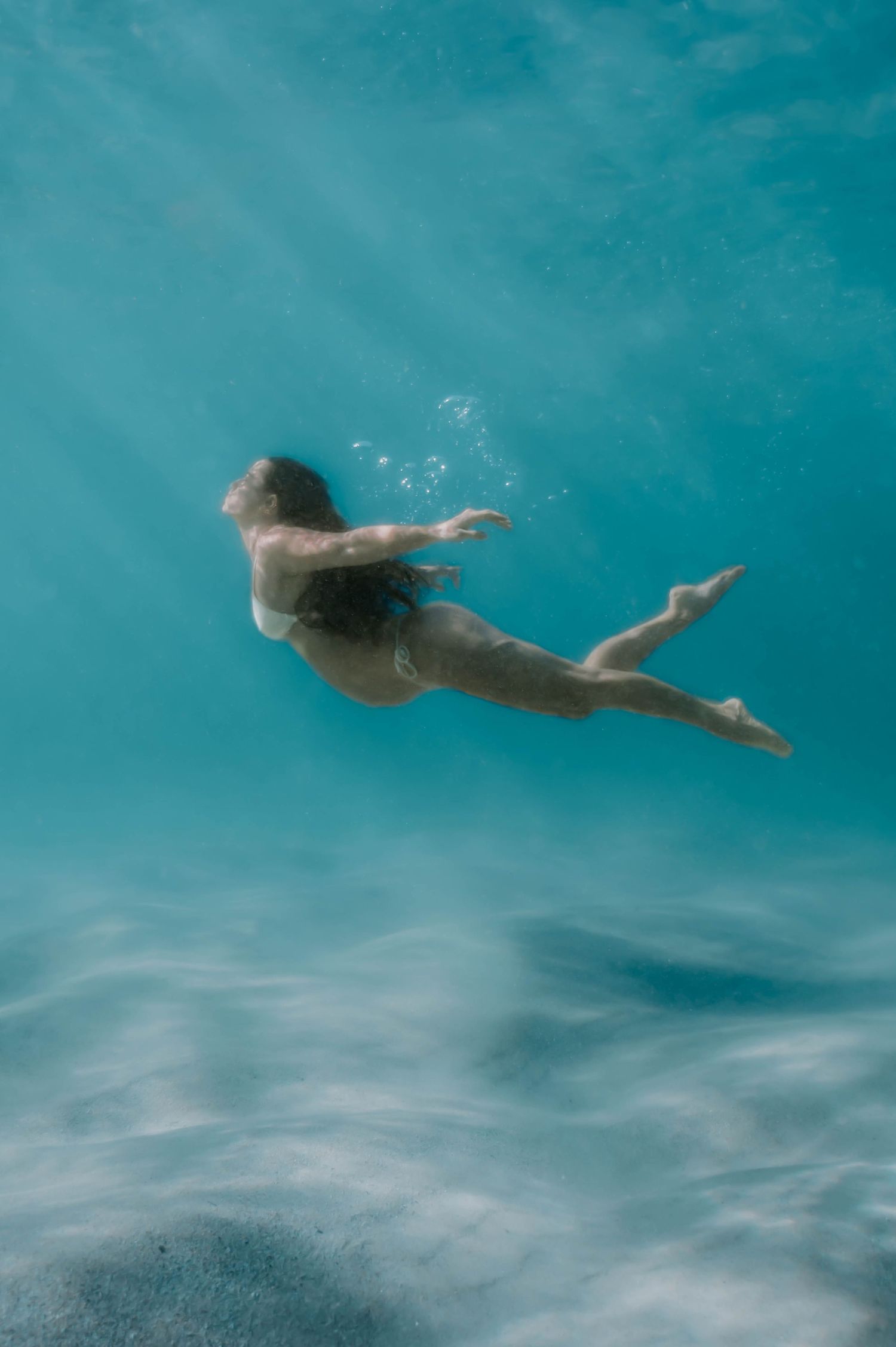 Brisbane Underwater Maternity Photographer Ocean and beach Sunshine Coast Pregnancy photos Surf and ocean photoshoots