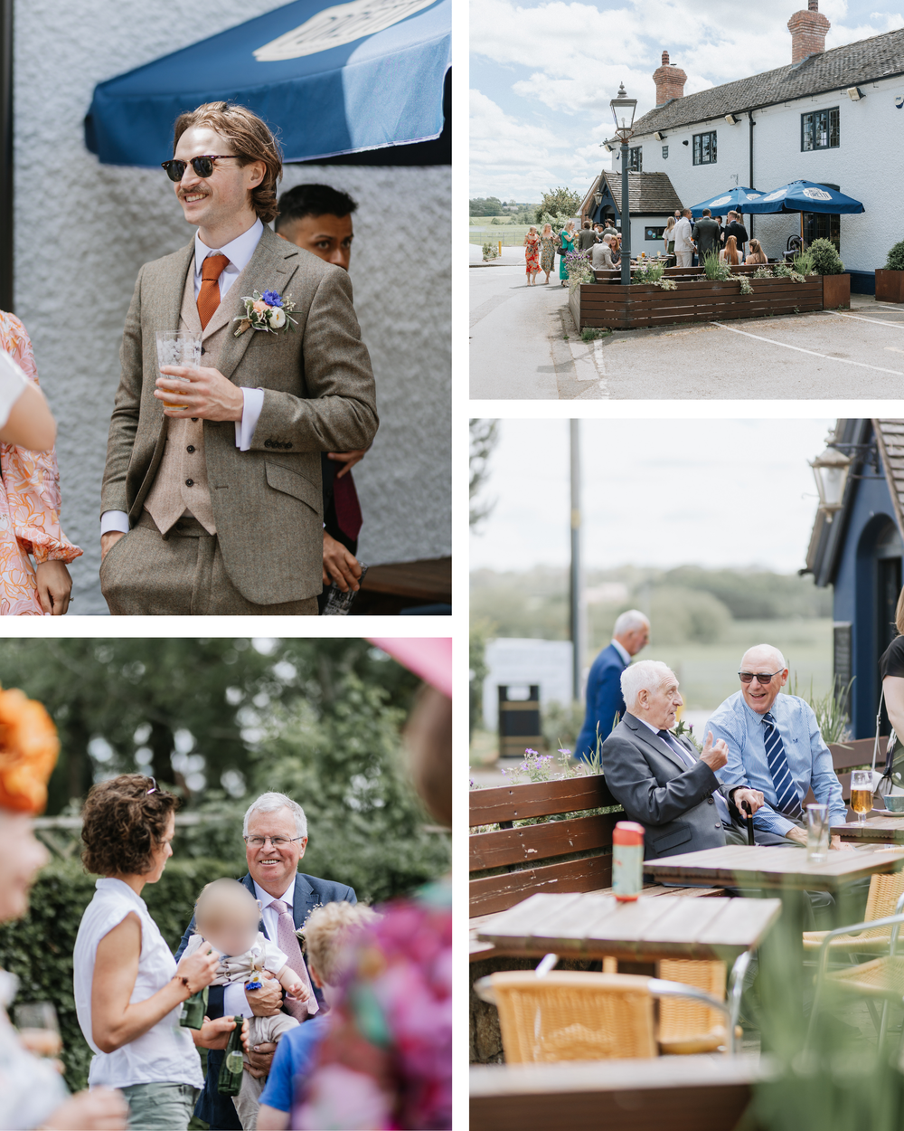 Outdoor wedding reception at a countryside pub with guests in formal attire enjoying drinks on a sunny summer day.