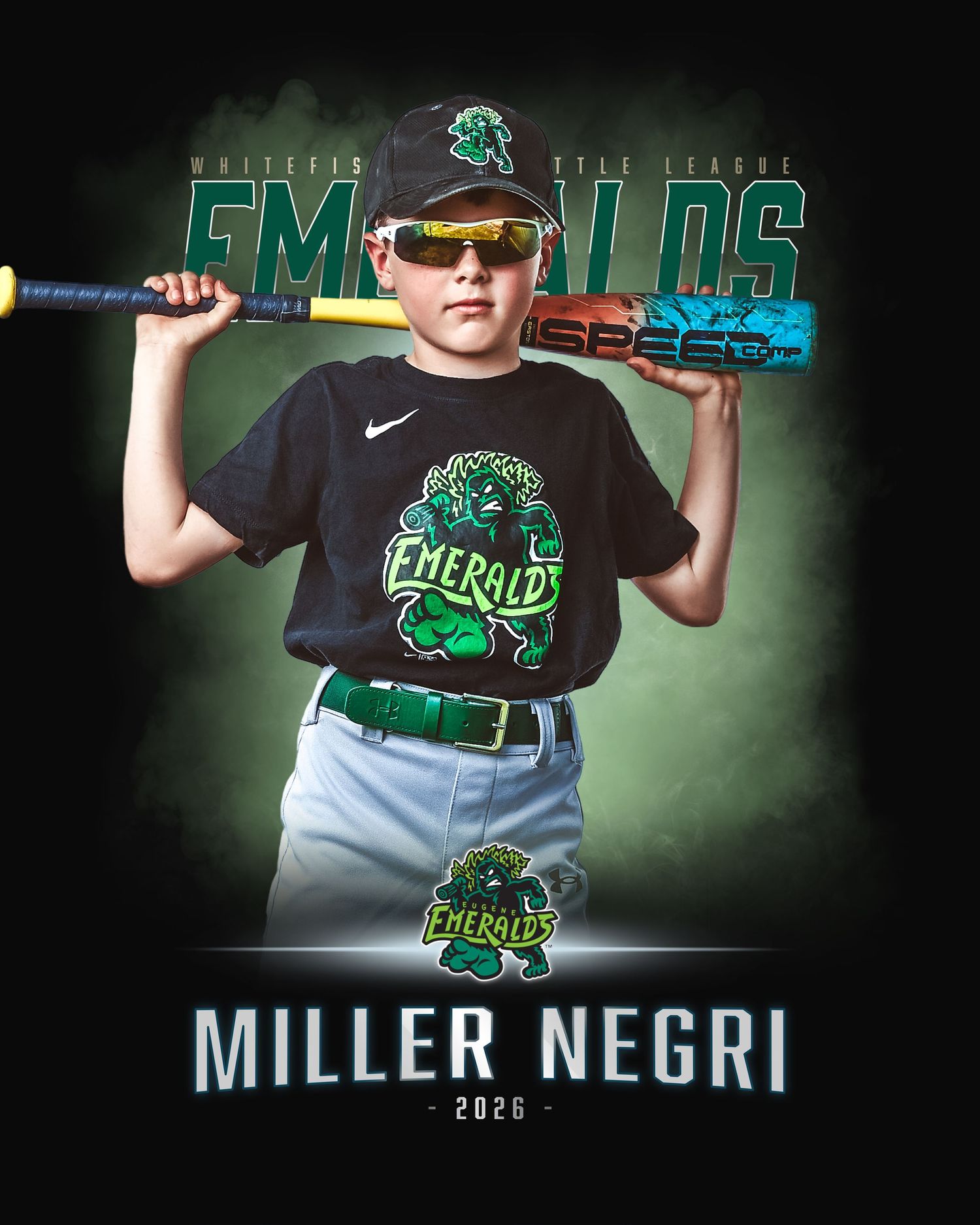 Young baseball player Everett Meulendyke in Grasshoppers uniform holding Easton bat, 2020 youth league portrait.
