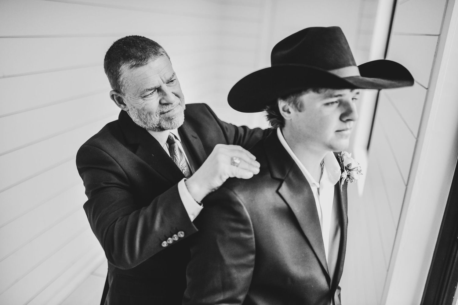 Wedding morning moments in groom suite