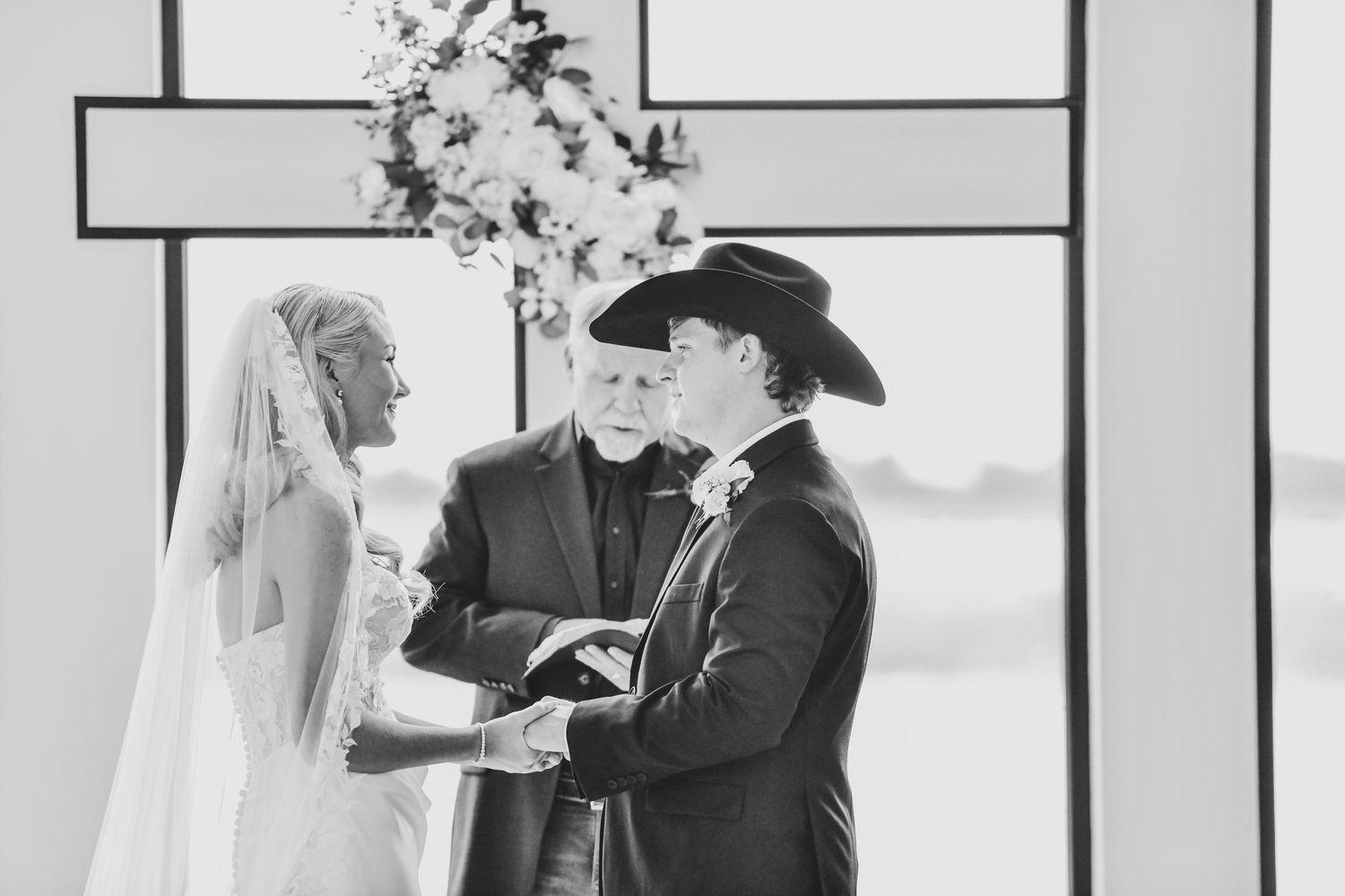 Bride and groom standing at altar during ceremony