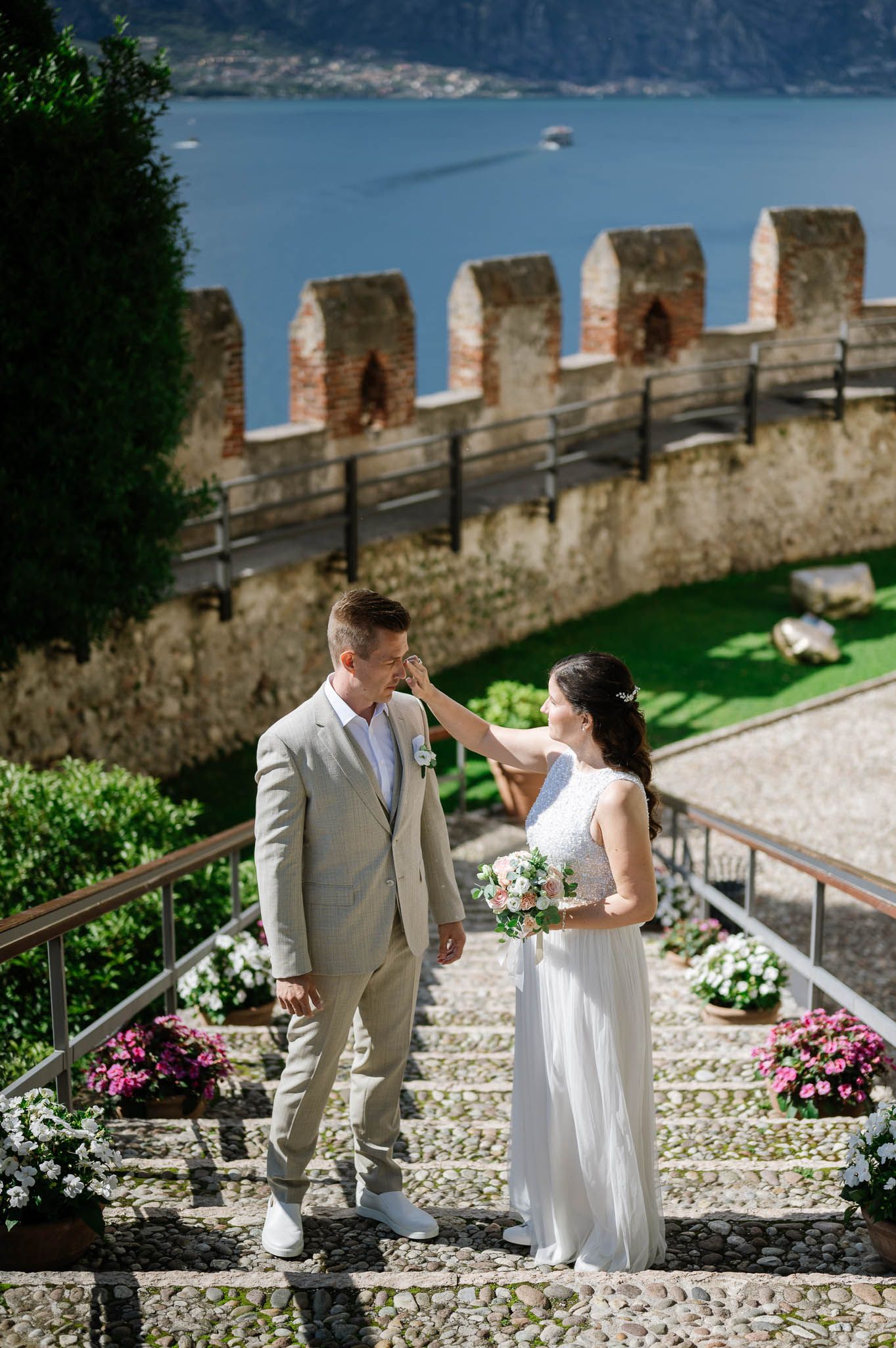 Couple before civil ceremony at Castello Scaligero of Malcesine - Lake Garda - Italy