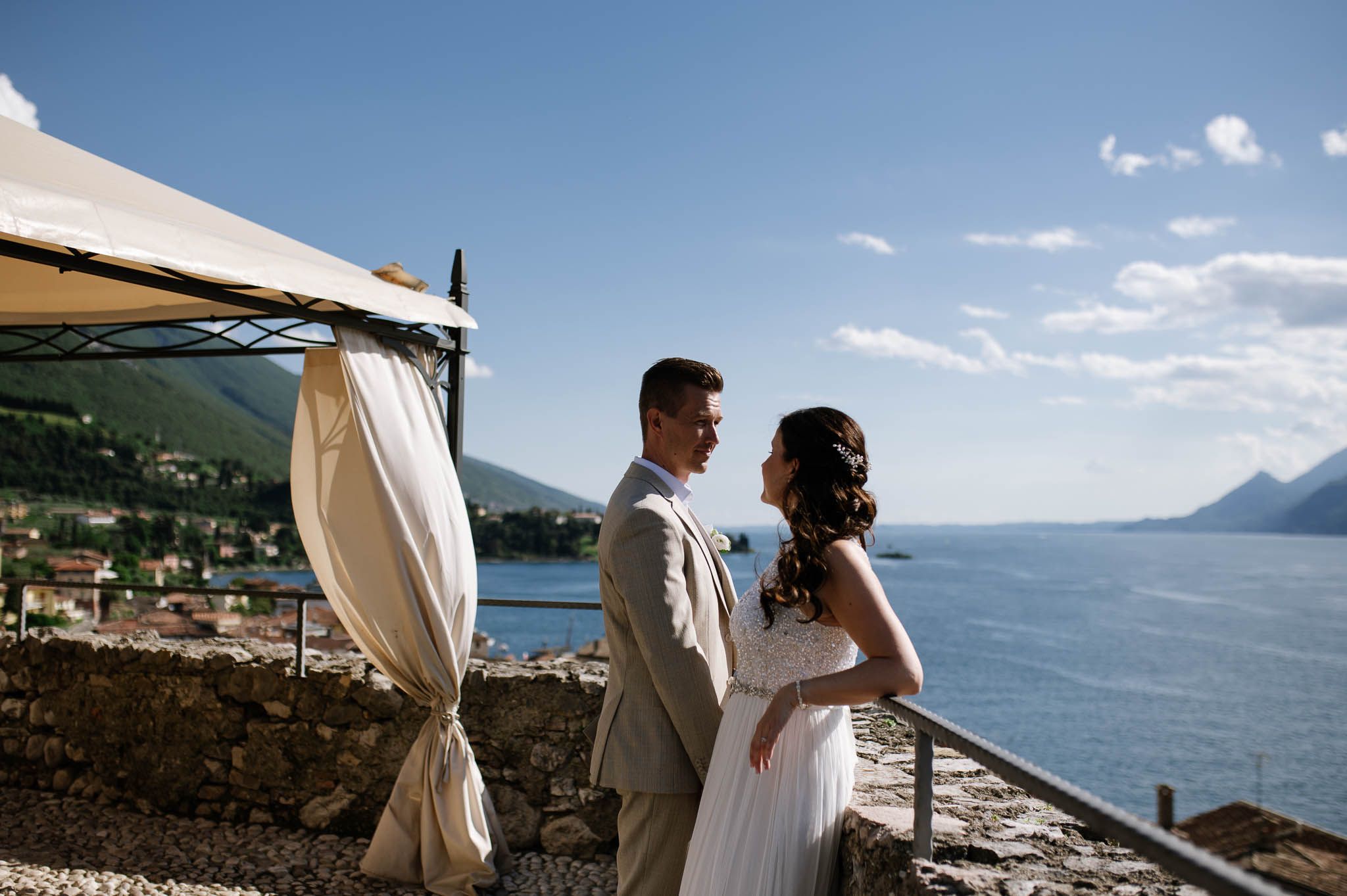 Newlyweds overlooking Lake Garda after their wedding ceremony in Malcesine - Garda - Verona