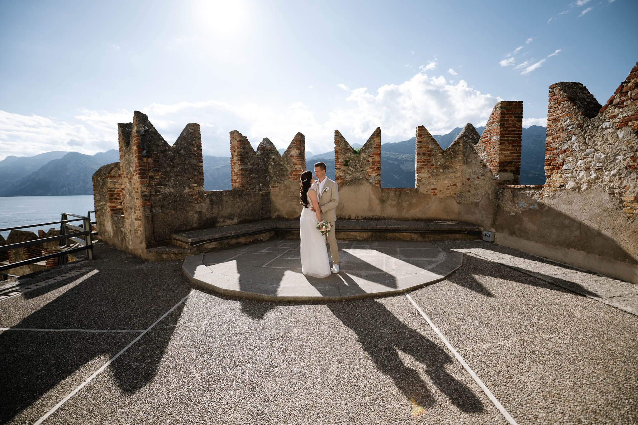 Couple session during a wedding in Italy at Castle of Malcesine