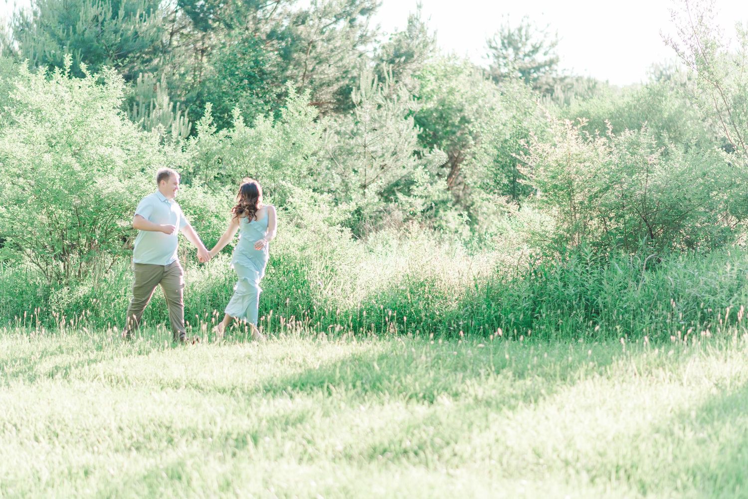 Engagement session at Quemahoning Reservoir in Johnstown Pennsylvania, running together
