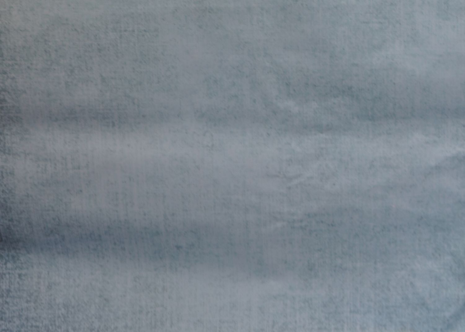Gray textured photography backdrop with gradient effect.