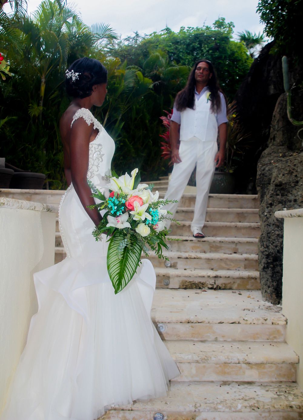 Wedding portrait of bride and groom kissing. Professional portrait of a client by Talented Studios Film and Photo LLC