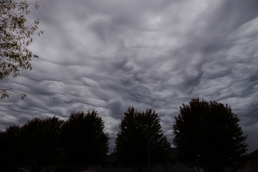 Dark Asperatus clouds, cloud formation photography, unique cloud patterns, Ottawa skies