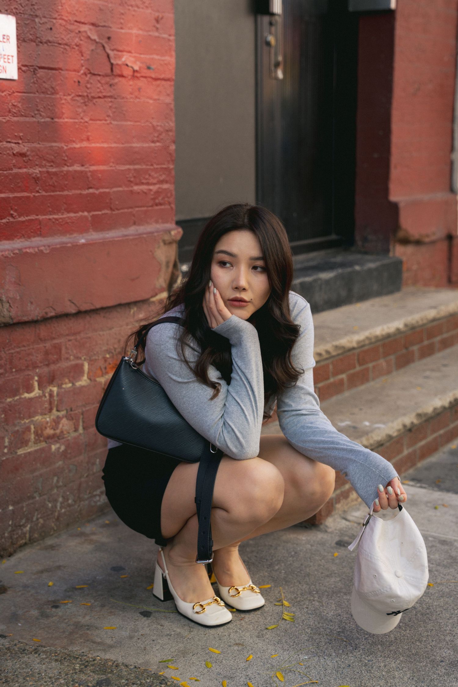 Vibrant portrait photoshoot of a woman in NYC, capturing the cinematic essence of the city’s bustling streets