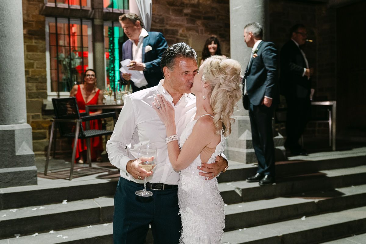 Bride and groom kissing at Manoir de Lébioles wedding night