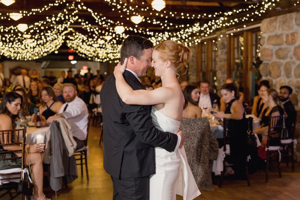 A couple shares their first dance at the towers, Narraganset wedding photography