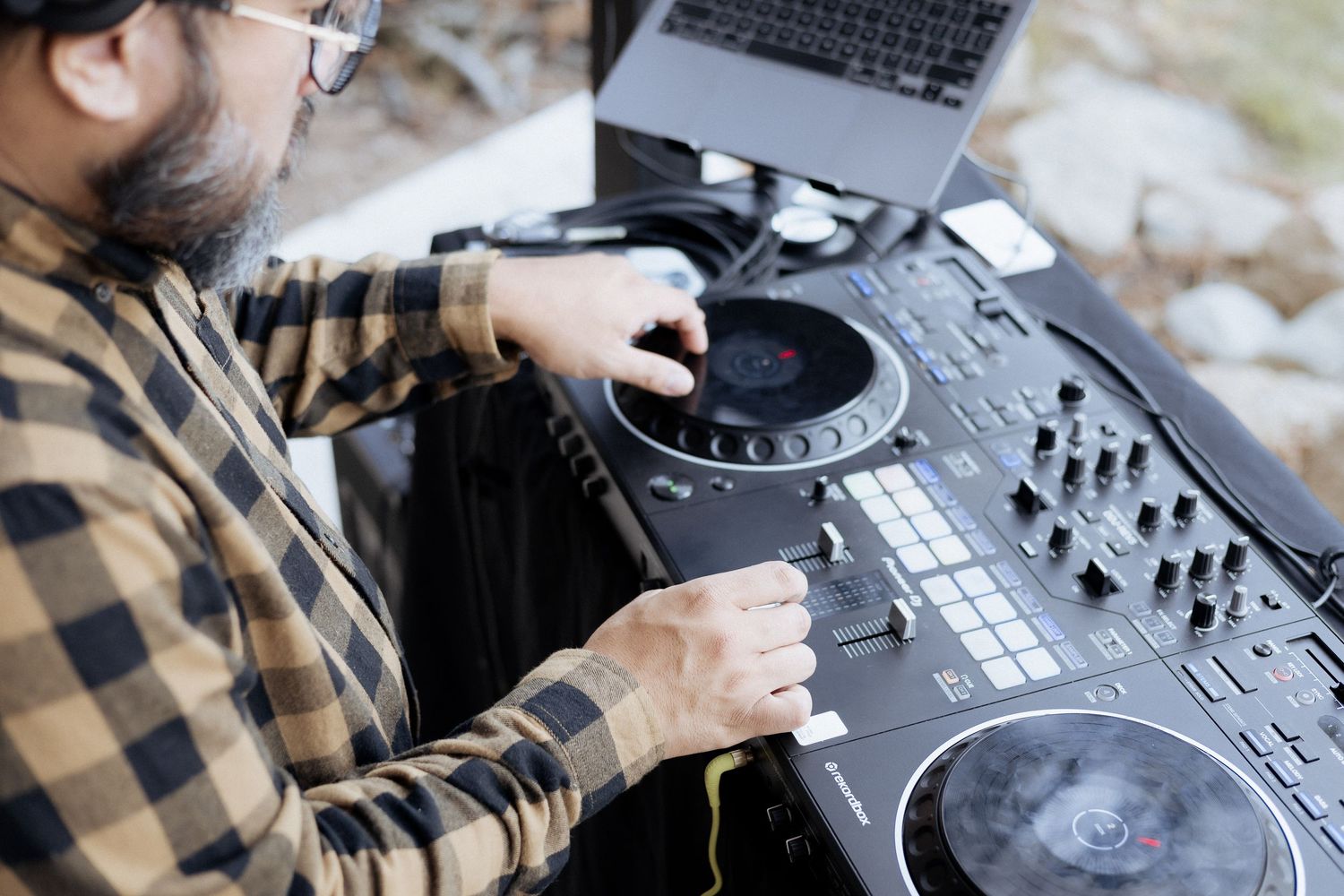 DJ playing music at Hope Wellness Eco Resort outdoor fall wedding Moncton wedding photographer New Brunswick luxury wedding photos fine art